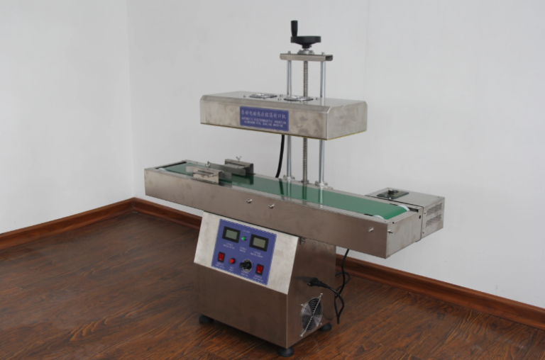 Máy dán màng seal tự động