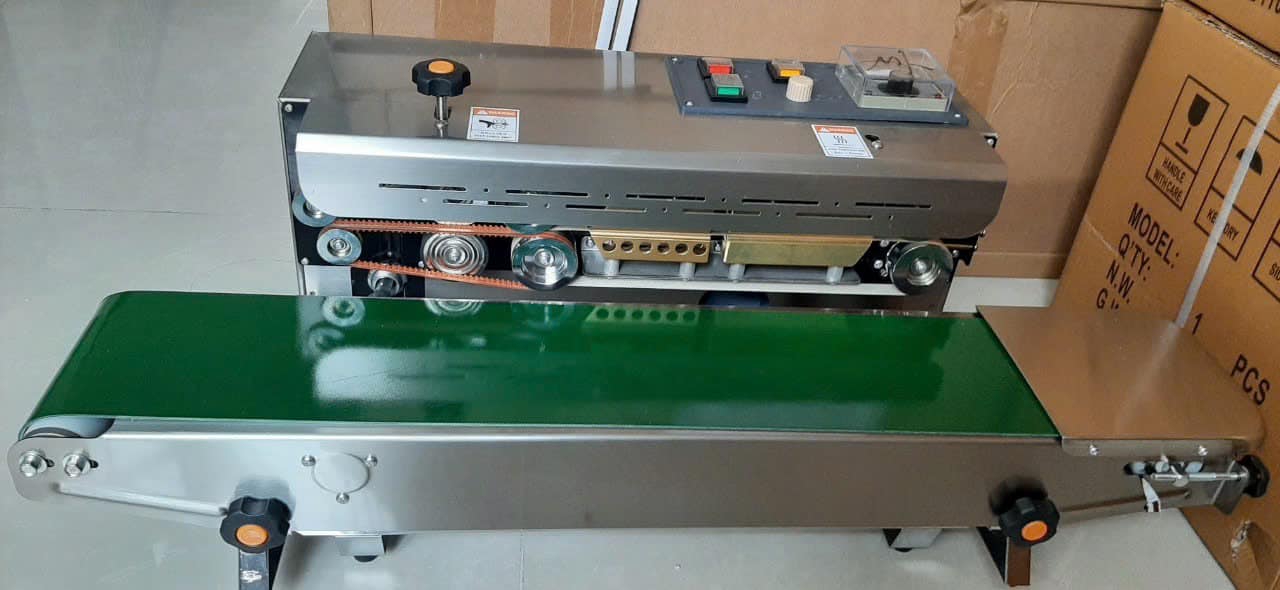 máy hàn miệng túi liên tục hút chân không